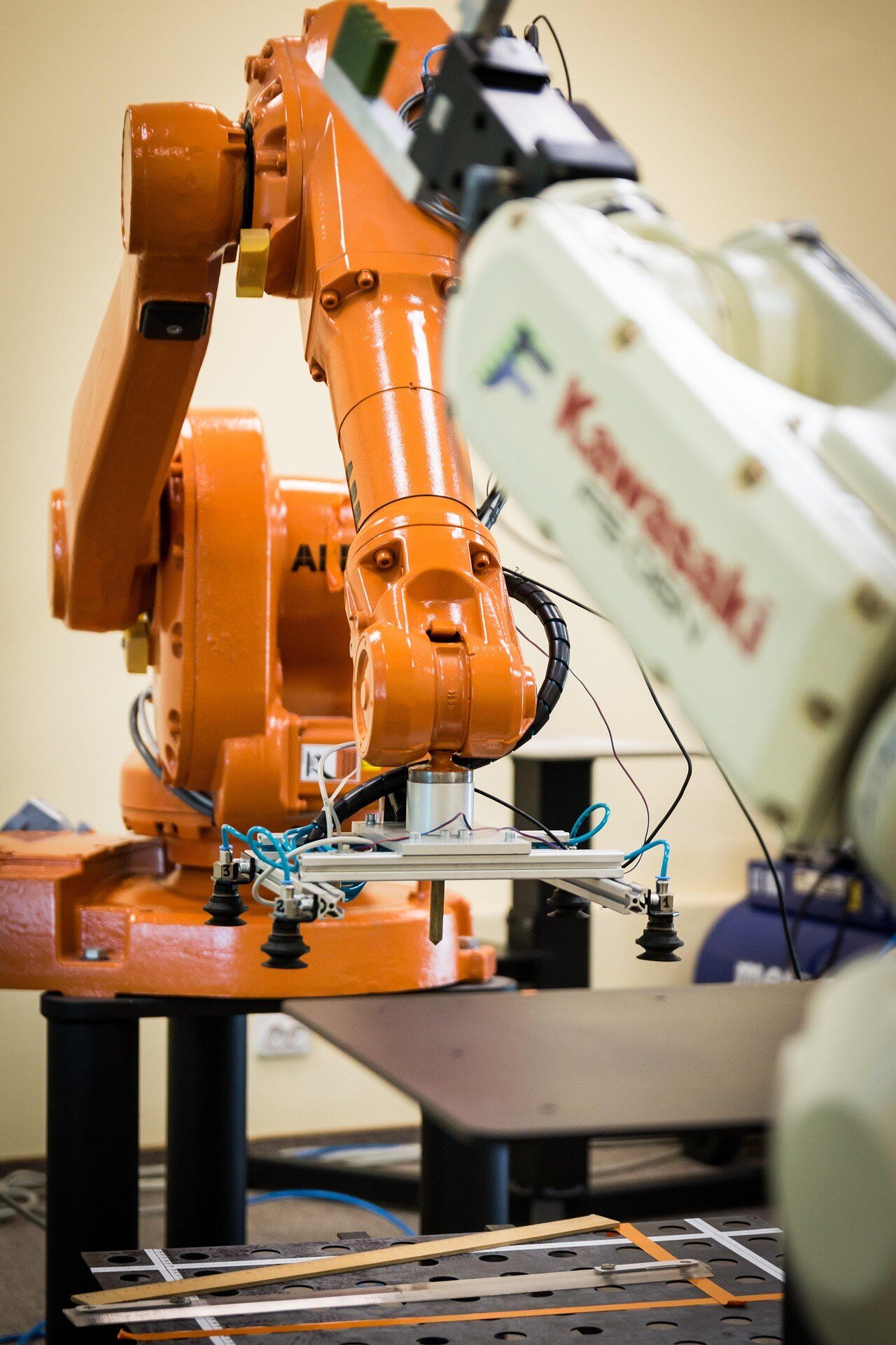 Robotic automation system with inspection tools, representing rising quoting activity in machine building.